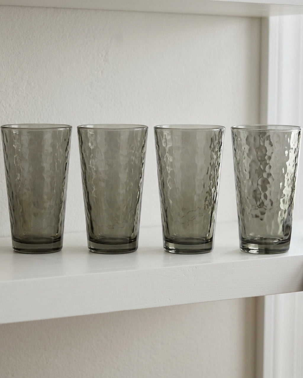 Buxto Tapered Hammered Cooler Glasses 16 oz Smoke Set of 4 - Lifestyle view