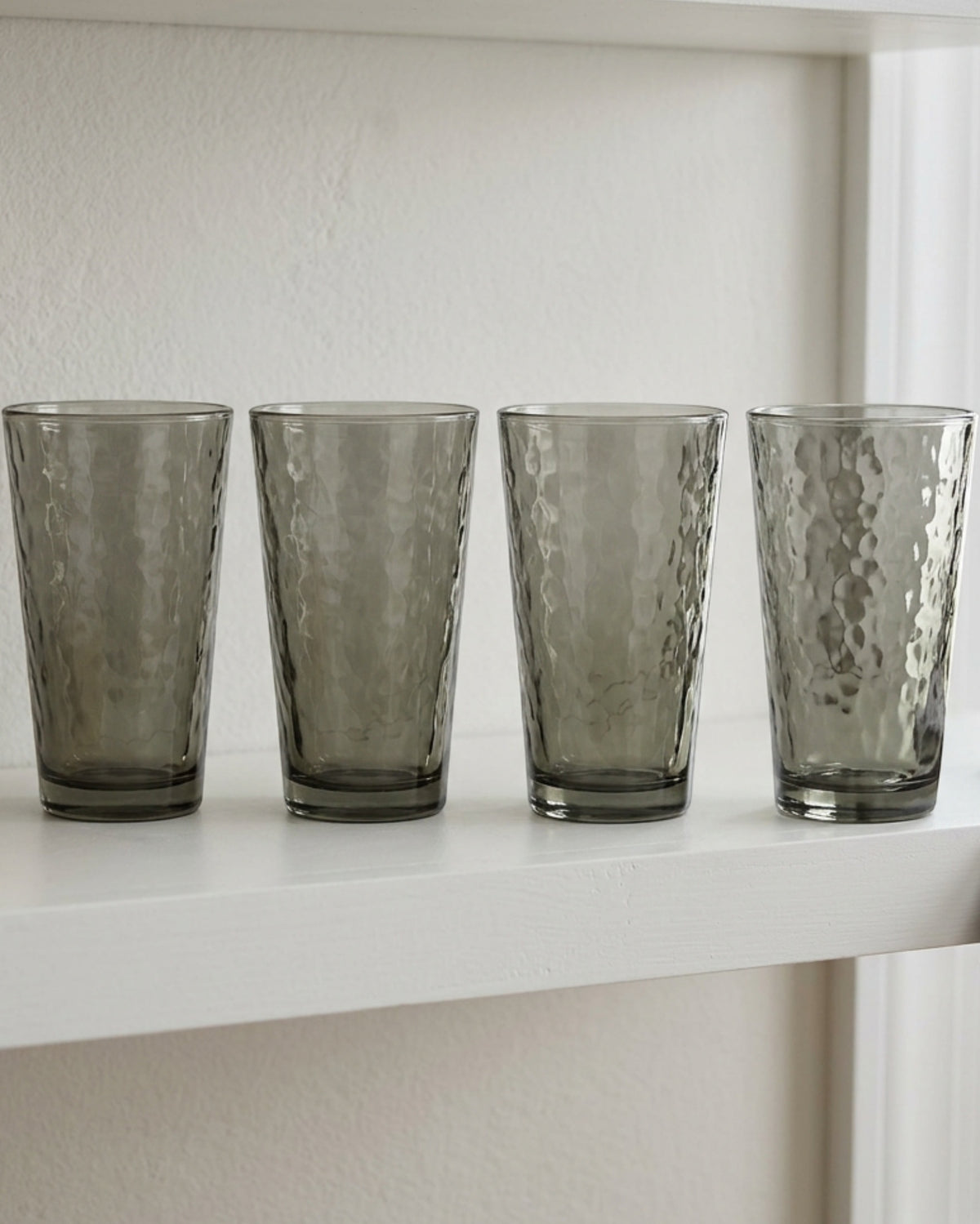 Buxto Tapered Hammered Cooler Glasses 16 oz Smoke Set of 4 - Lifestyle view